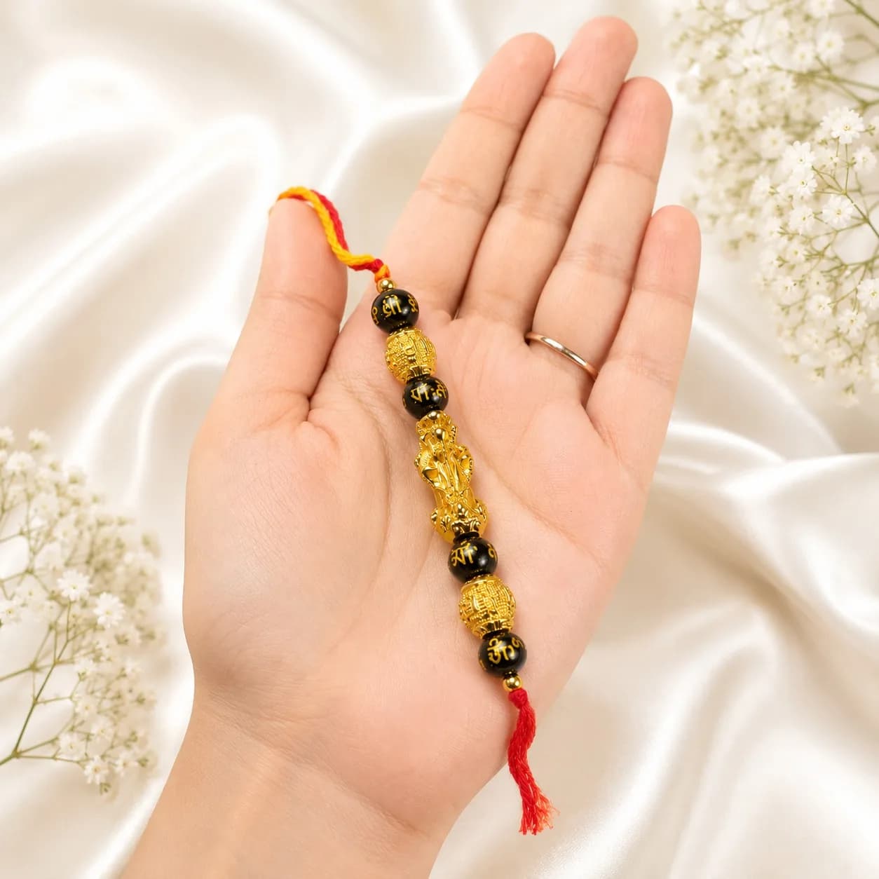 Golden feng shui rakhi - View 2