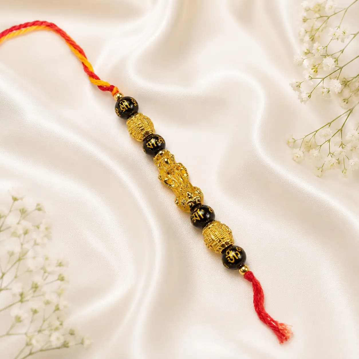 Golden feng shui rakhi - View 1